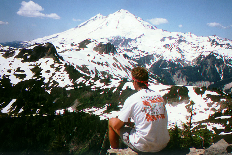 High up on Mount Shuksan with Mount Baker in the distance